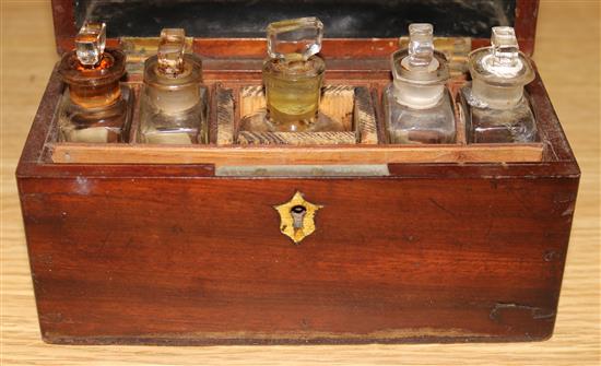 A small apothercary casket, containing five bottles
